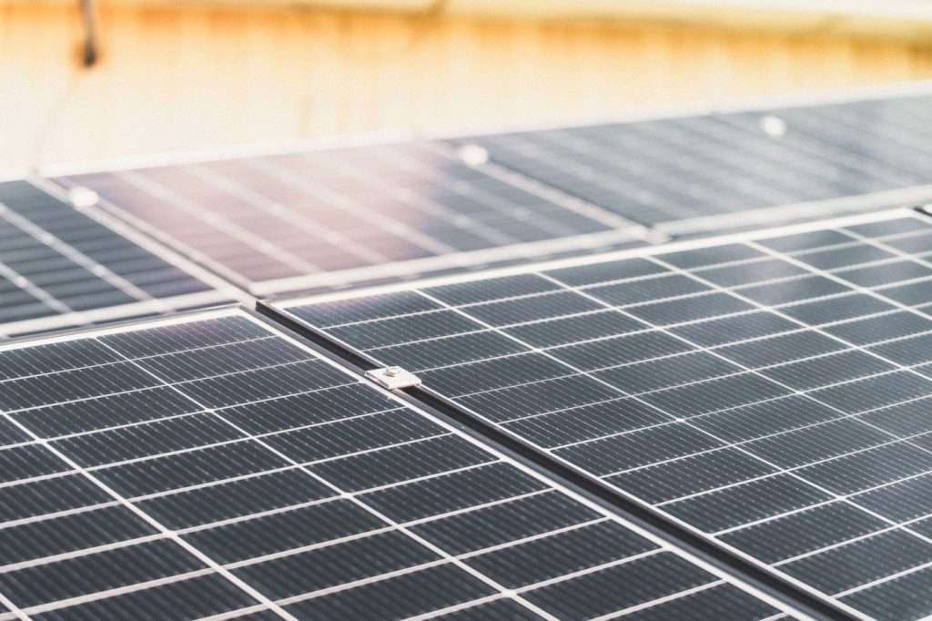 A rooftop solar array catching the sun